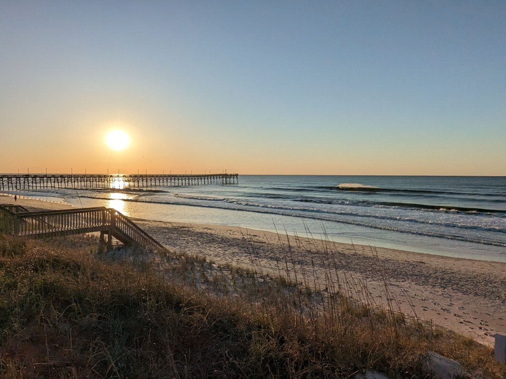 View of Topsail Beach near Surf City Pier, North Carolina, April 2023. Image by Phoebe, licensed under CC BY-SA 4.0 International.